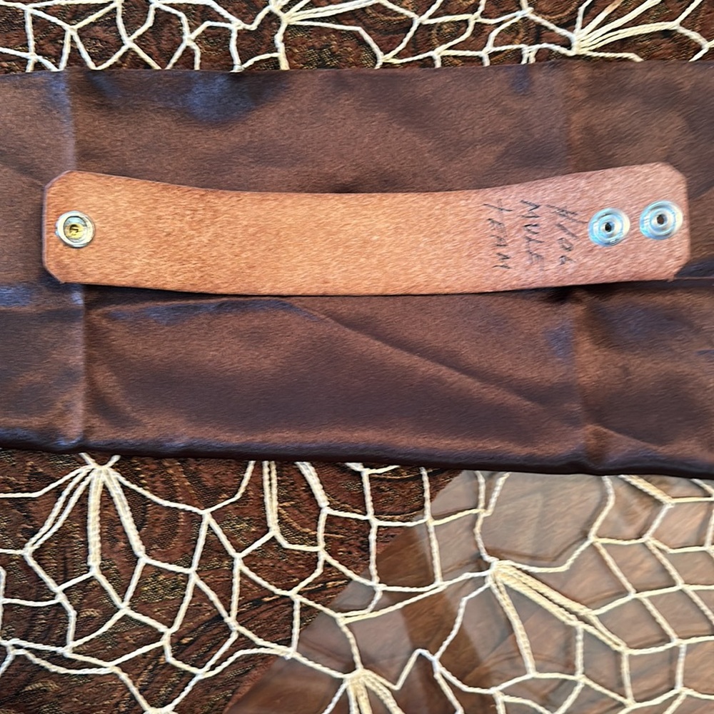 Stamped, genuine leather cuff. - Picture 6 of 10